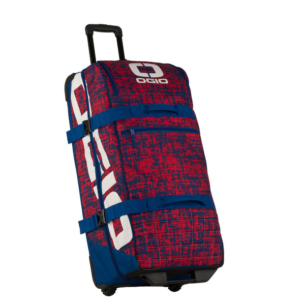 TRUCKER GEARBAG - CHAOS RED/BLUE